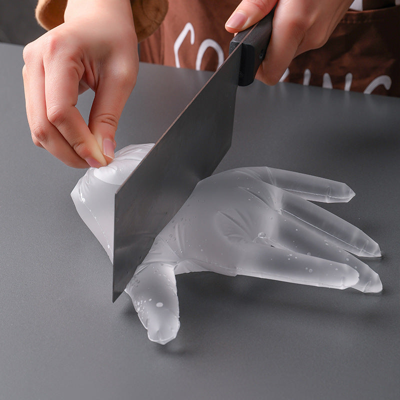 Heavy-duty disposable gloves displayed in a box
