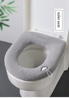 Plush purple-pink toilet seat cover on a standard toilet