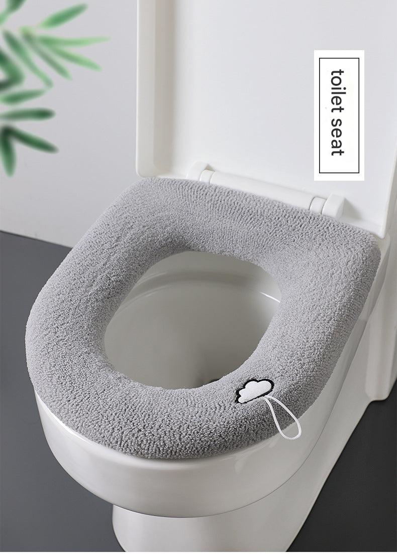 Plush purple-pink toilet seat cover on a standard toilet