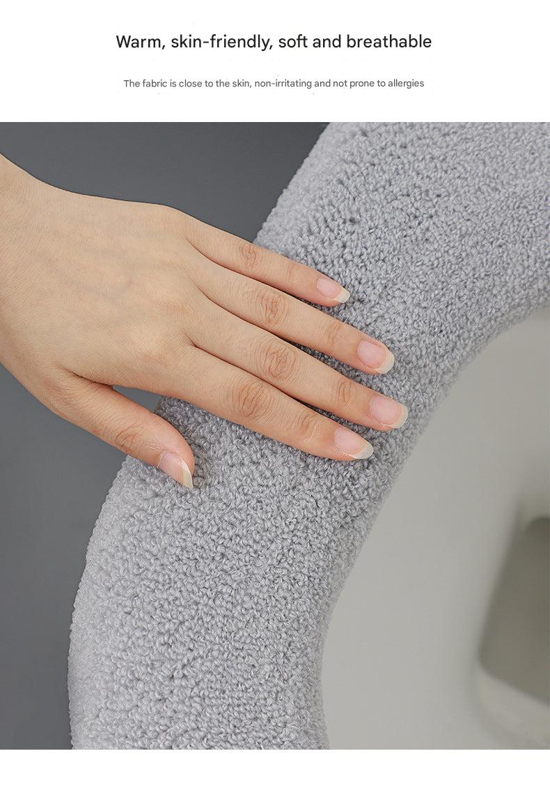 Comfortable light grey toilet seat cover displayed on toilet