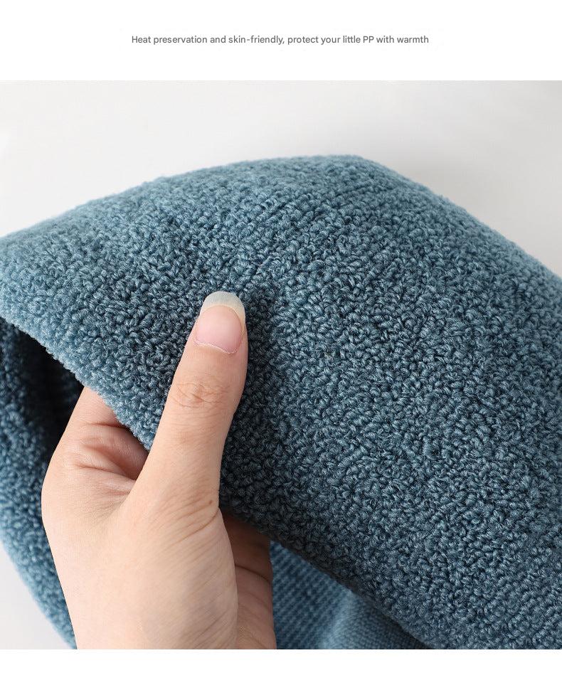 Comfortable light grey toilet seat cover displayed on toilet