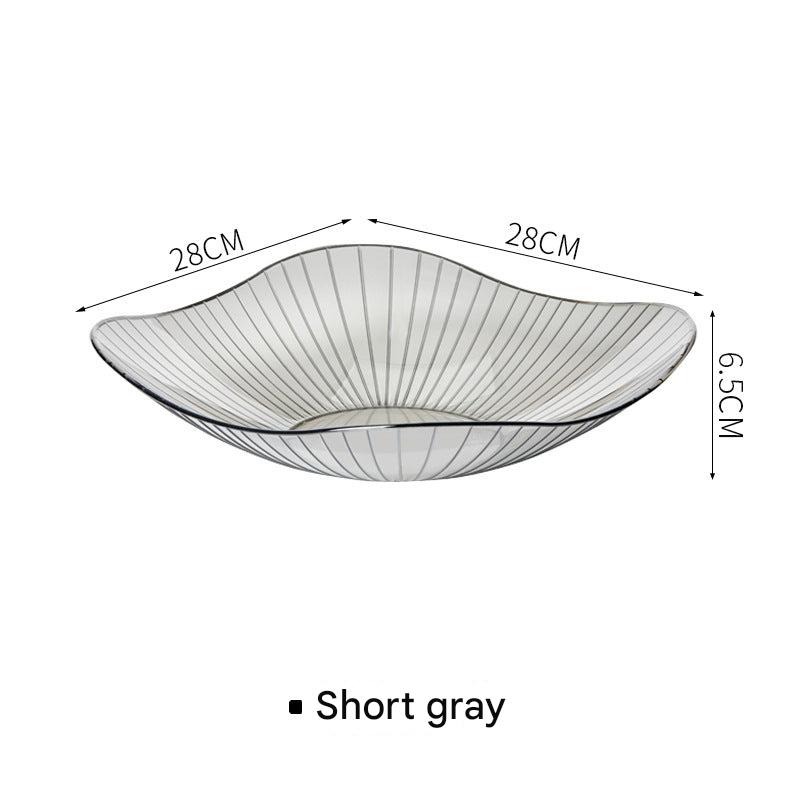 Elegant grey fruit bowl with fruits