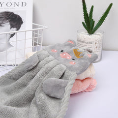 cute coral velvet towel hanging up