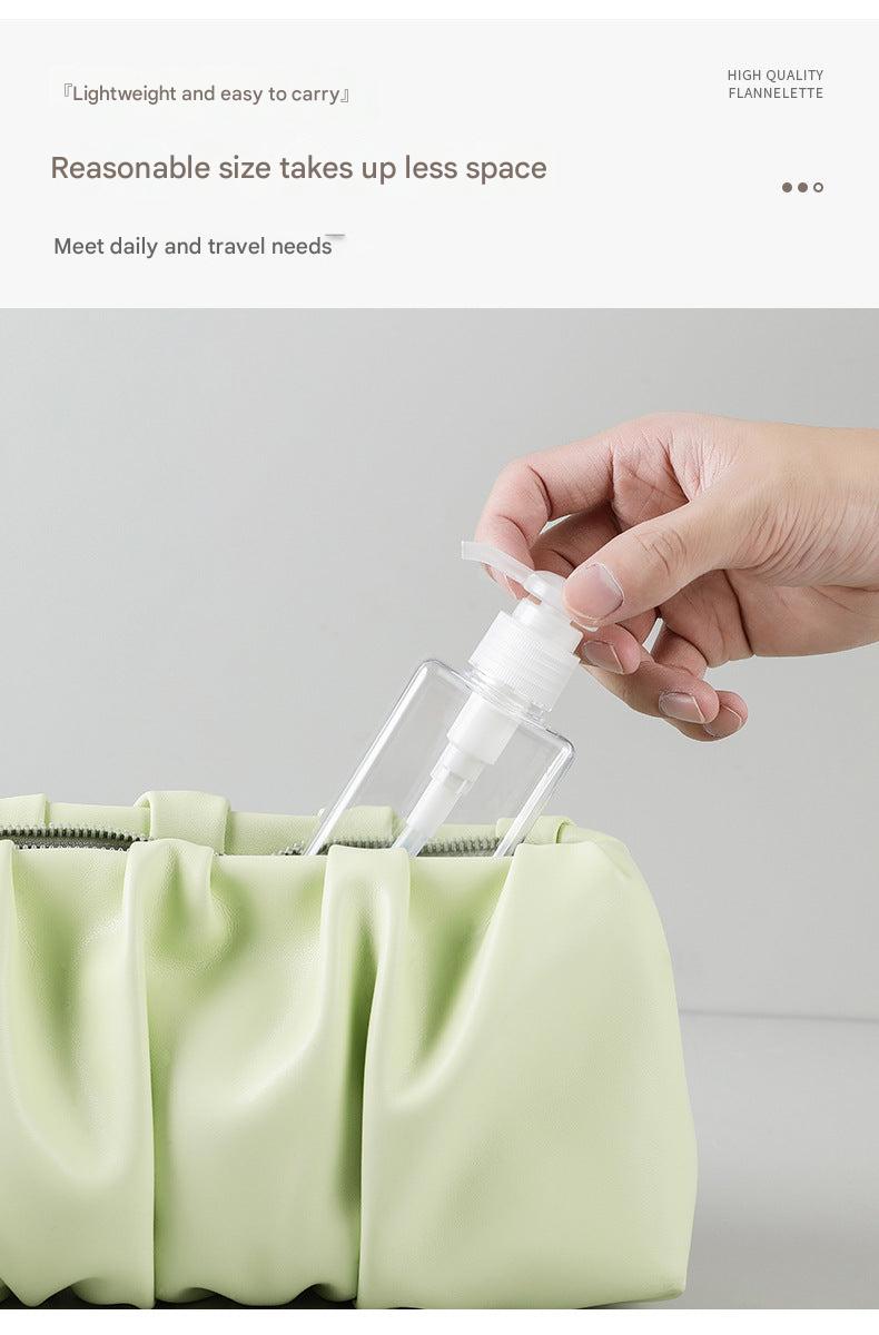 multiple sizes of travel bottles