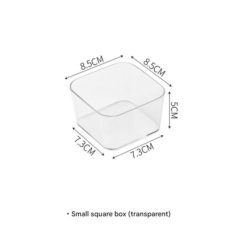 Office supplies neatly arranged in a transparent organizer
