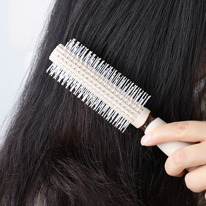 Showing the cushion brush's ergonomic design.