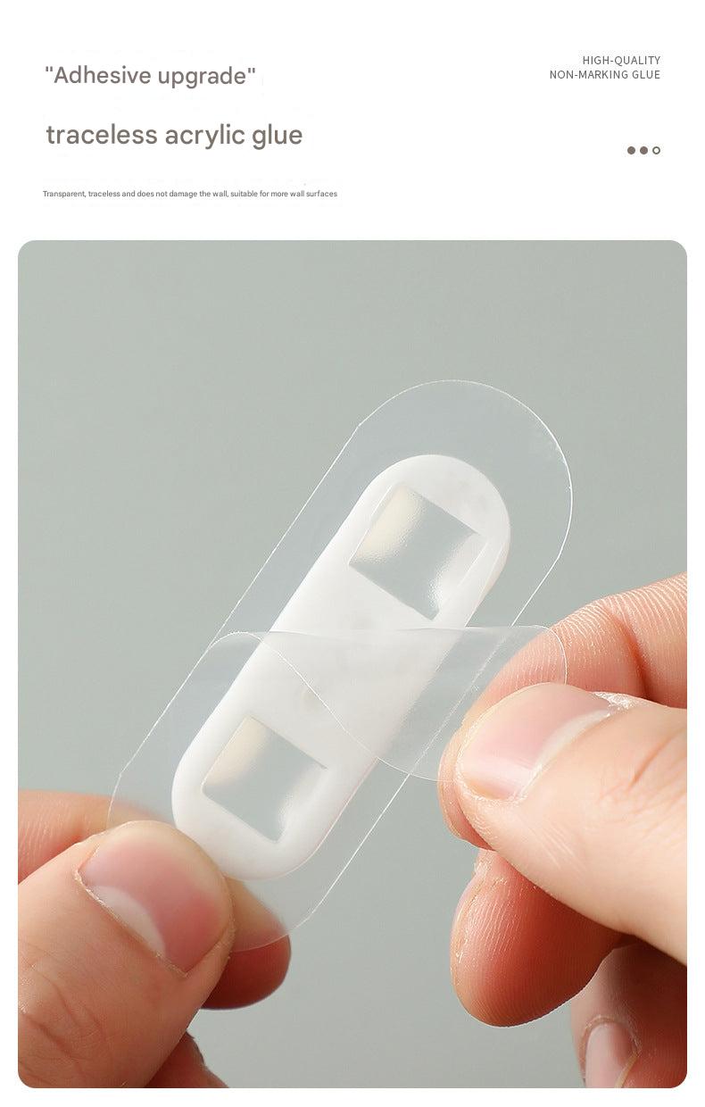 Pack of self-adhesive clips for wall mounting