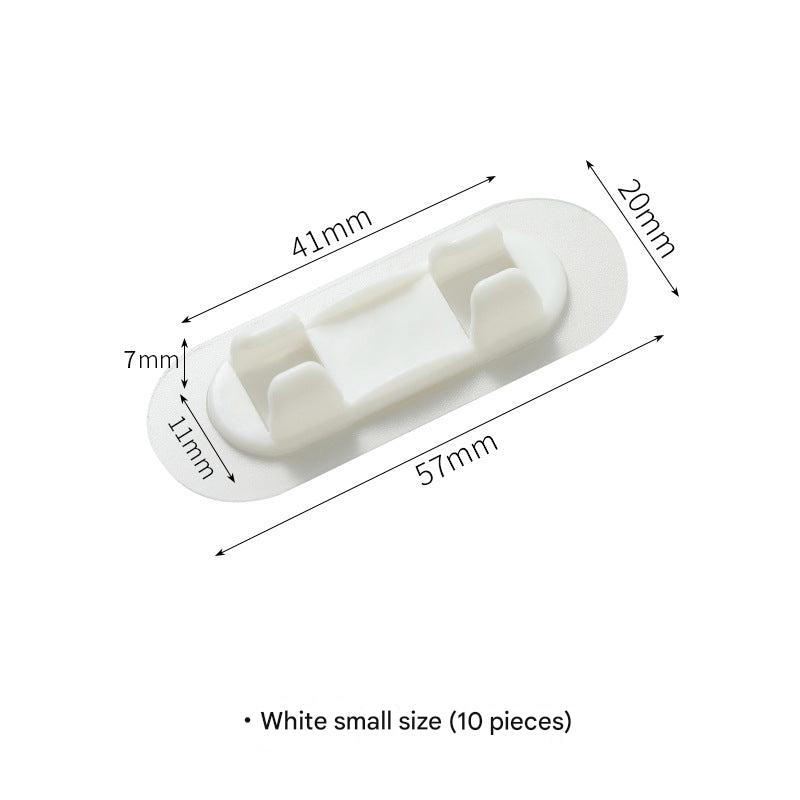 Organised cables with self-adhesive clip