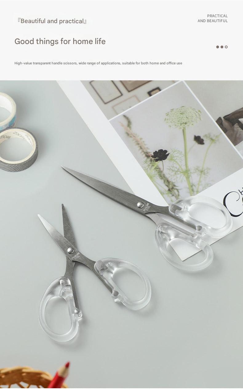 close-up of sharp scissor blades cutting paper