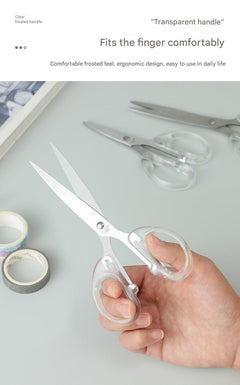 various sizes of professional scissors on a work table