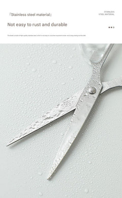 high-quality stainless steel scissors resting on a surface