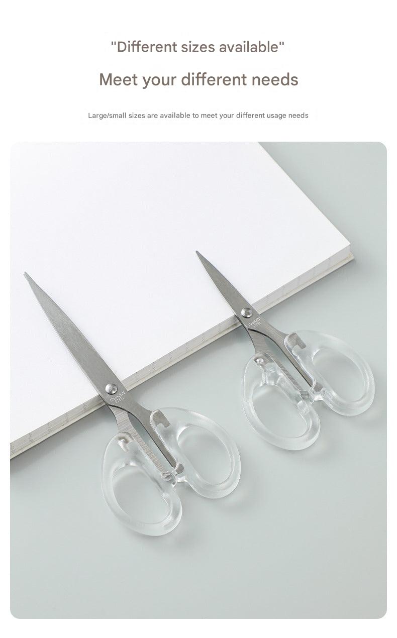 hands using scissors for a crafting project