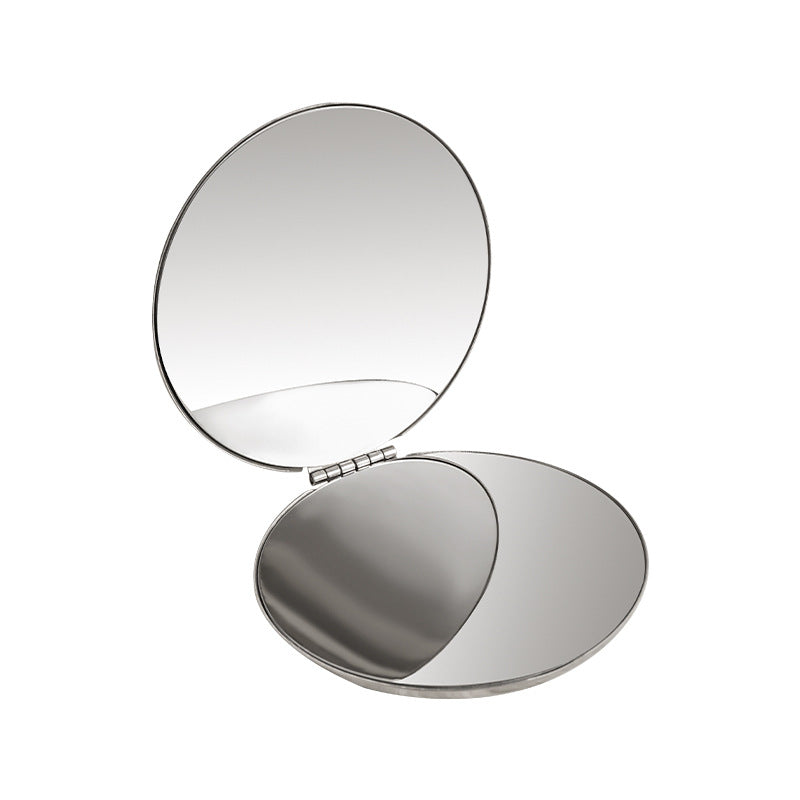 Compact makeup mirror open for use