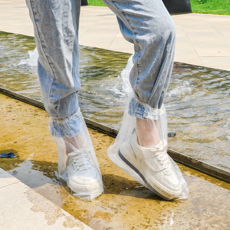 Heavy-duty clear plastic shoe covers in packaging