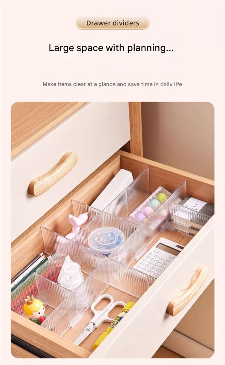 Durable plastic dividers in an organised drawer