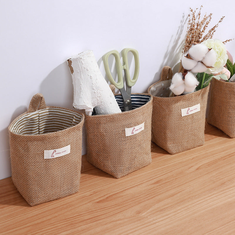 Wall-mounted storage pouch with dark blue stripes