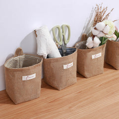 Wall-mounted storage pouch with dark blue stripes