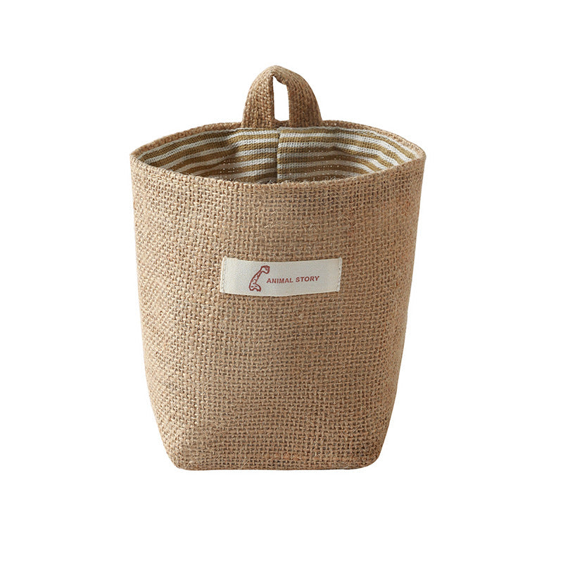 Compact wall-mounted pouch for organisation
