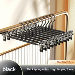 Fashionable dark green pants hanger for stylish interiors