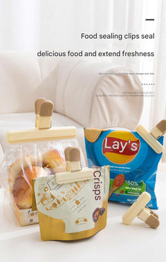 Food sealing clips in use for sealing snack bags