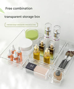 Clear organiser box with various small items