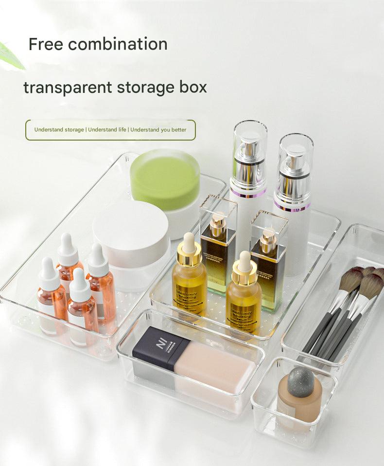 Clear organiser box with various small items