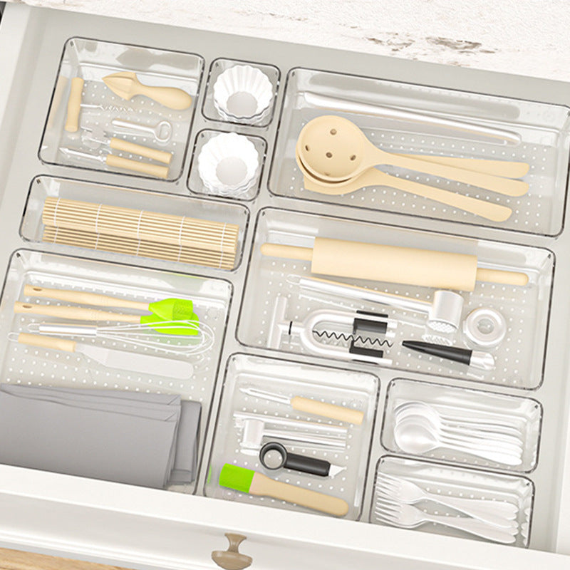 Clear organiser box with various small items