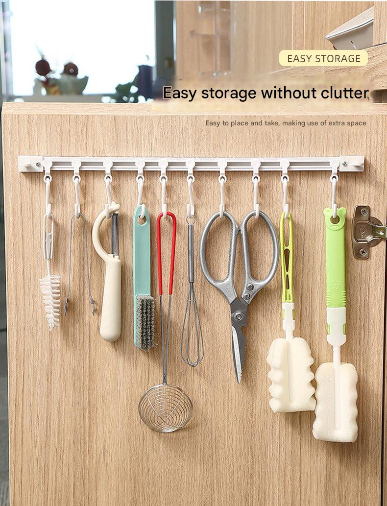 Essential sliding hook rack installed on cabinet door