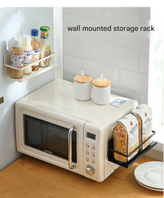 Magnetic paper towel holder mounted on fridge