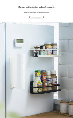 White magnetic rack with paper towels attached