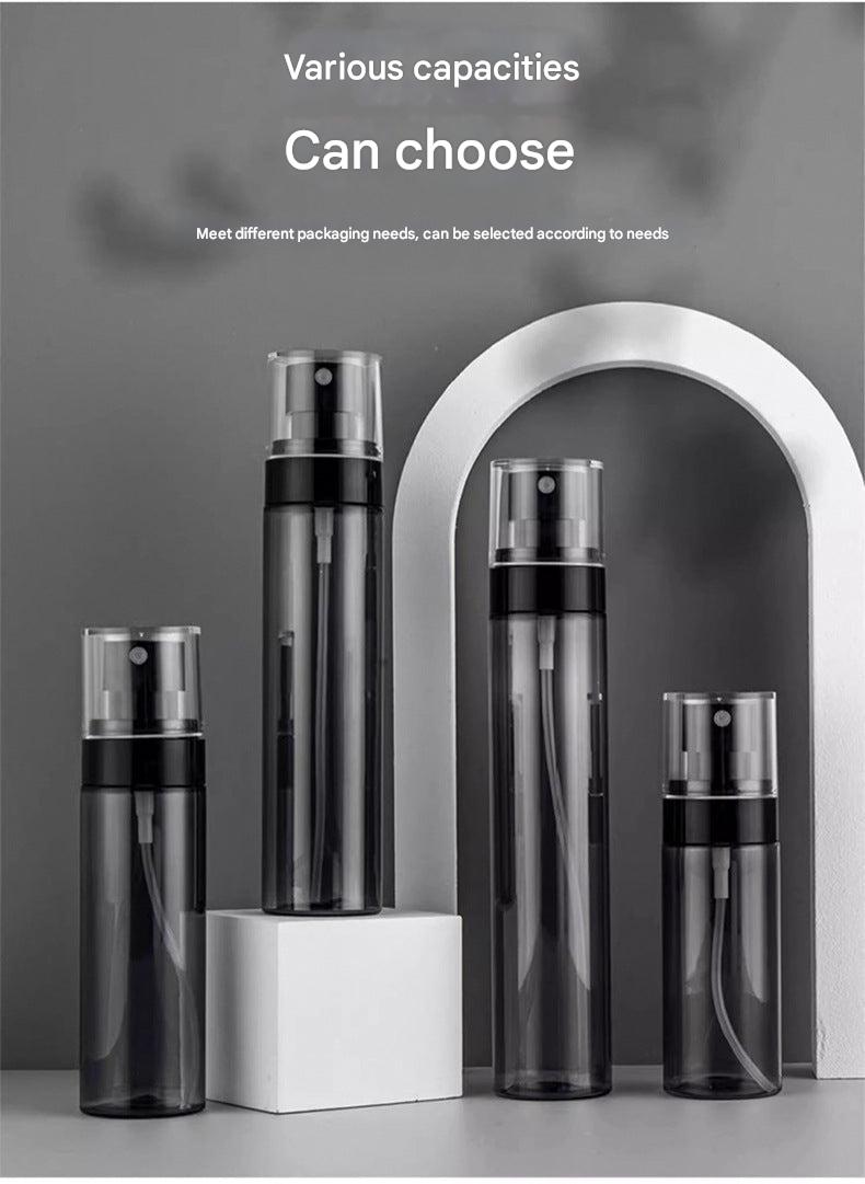 Fine mist facial spray bottle in a travel setting