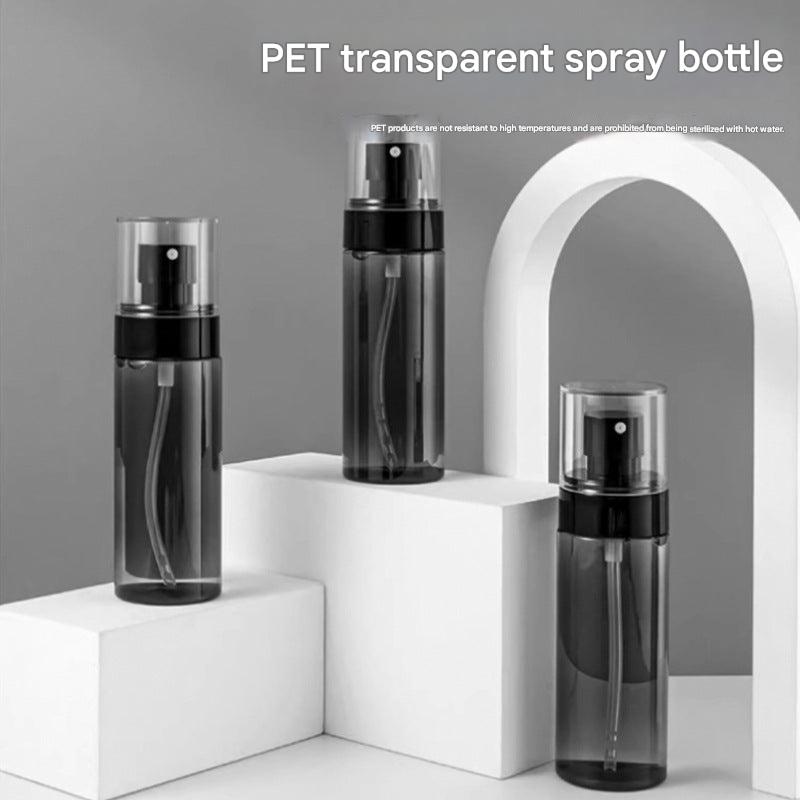 Fine mist facial spray bottle in a travel setting