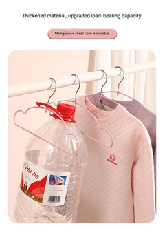 Durable thickened hangers holding toddler outfits