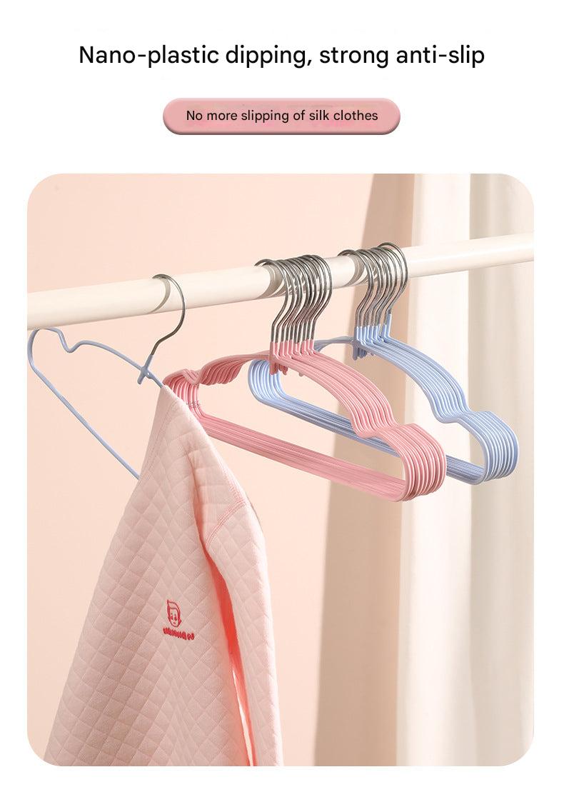 Stylish children's hangers displayed on a rack