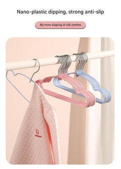Stylish children's hangers displayed on a rack