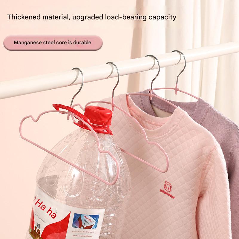 Stylish children's hangers displayed on a rack