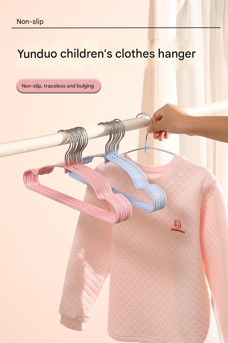 Organised nursery closet with colourful hangers