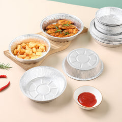 aluminium foil baking pan with food being prepared