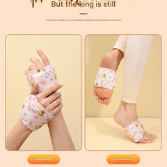 Foot heating pad positioned on a cozy blanket