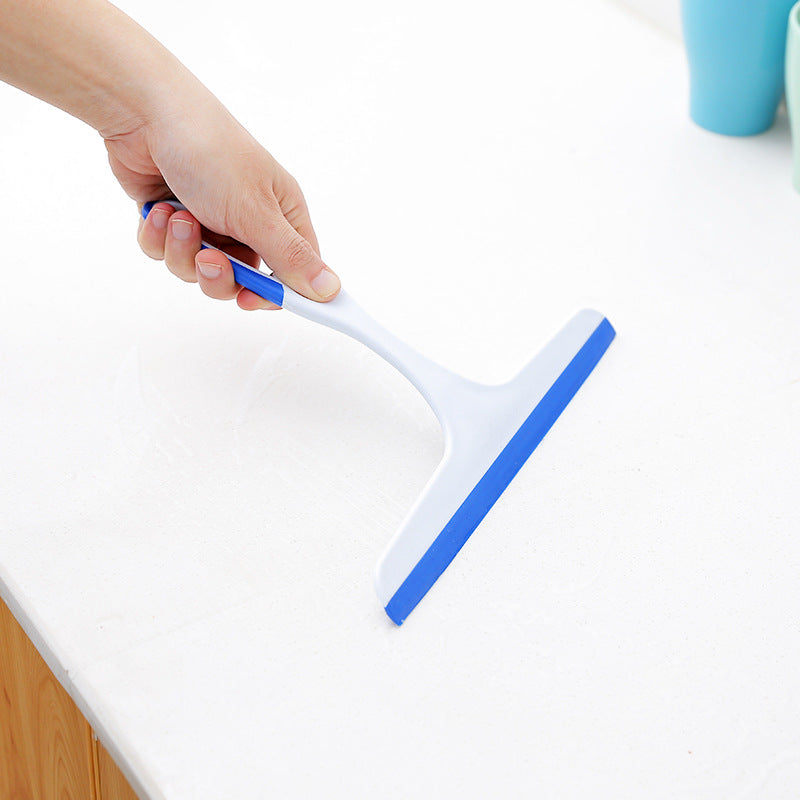 Squeegee in blue colour cleaning a window