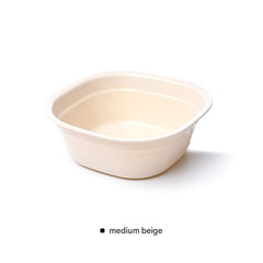 Lightweight plastic bowl being held in hand