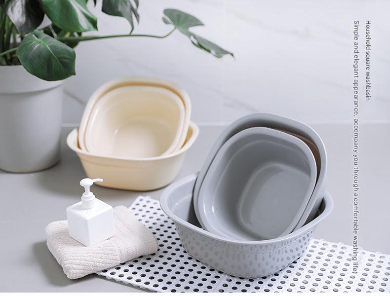 Stylish grey plastic bowl on a kitchen counter