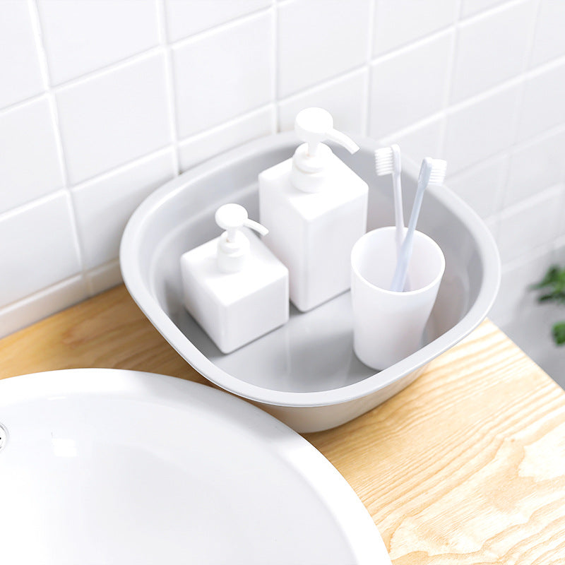 Stylish grey plastic bowl on a kitchen counter