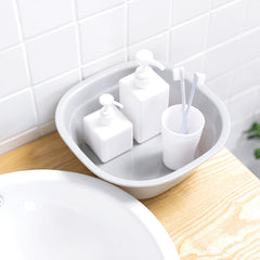 Stylish grey plastic bowl on a kitchen counter