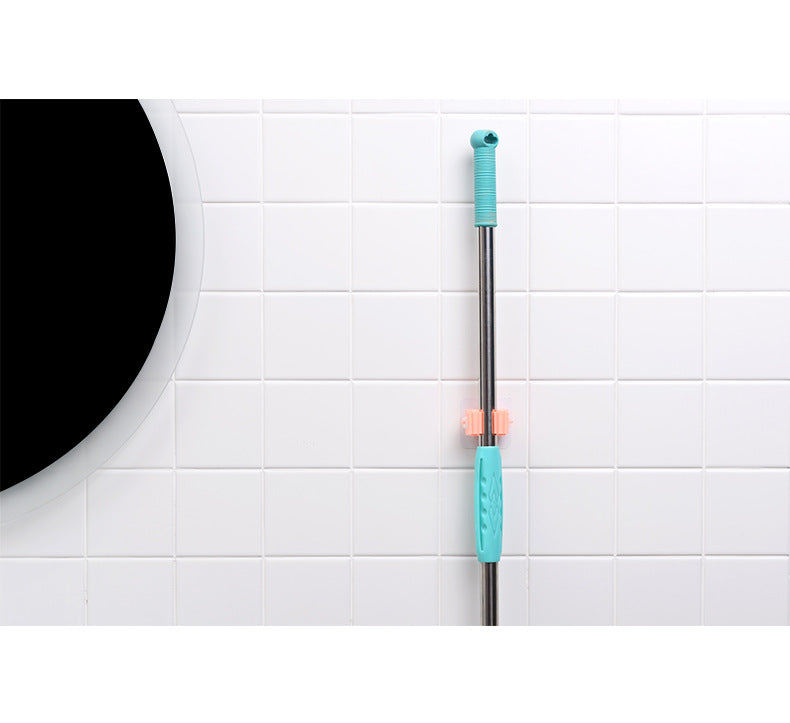 Powerful wall-mounted mop holder in white