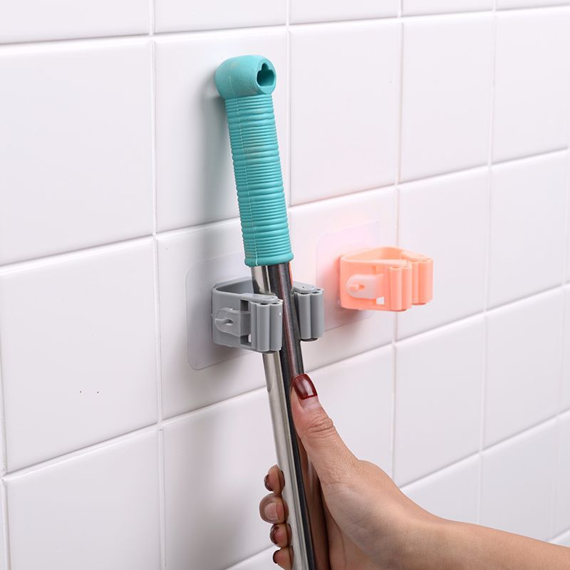 Strong adhesive mop holder for kitchen use