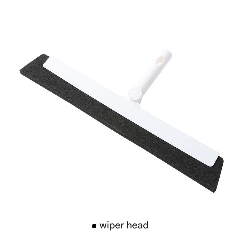 Magic mop with accessories on a bathroom floor