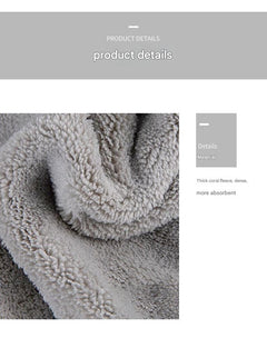 Bright coral fleece towel used for drying hands