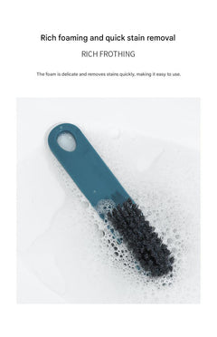 Cleaning brush in action during a laundry task - image 4