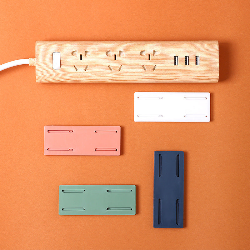 colourful wall-mounted cord organizers in different shades